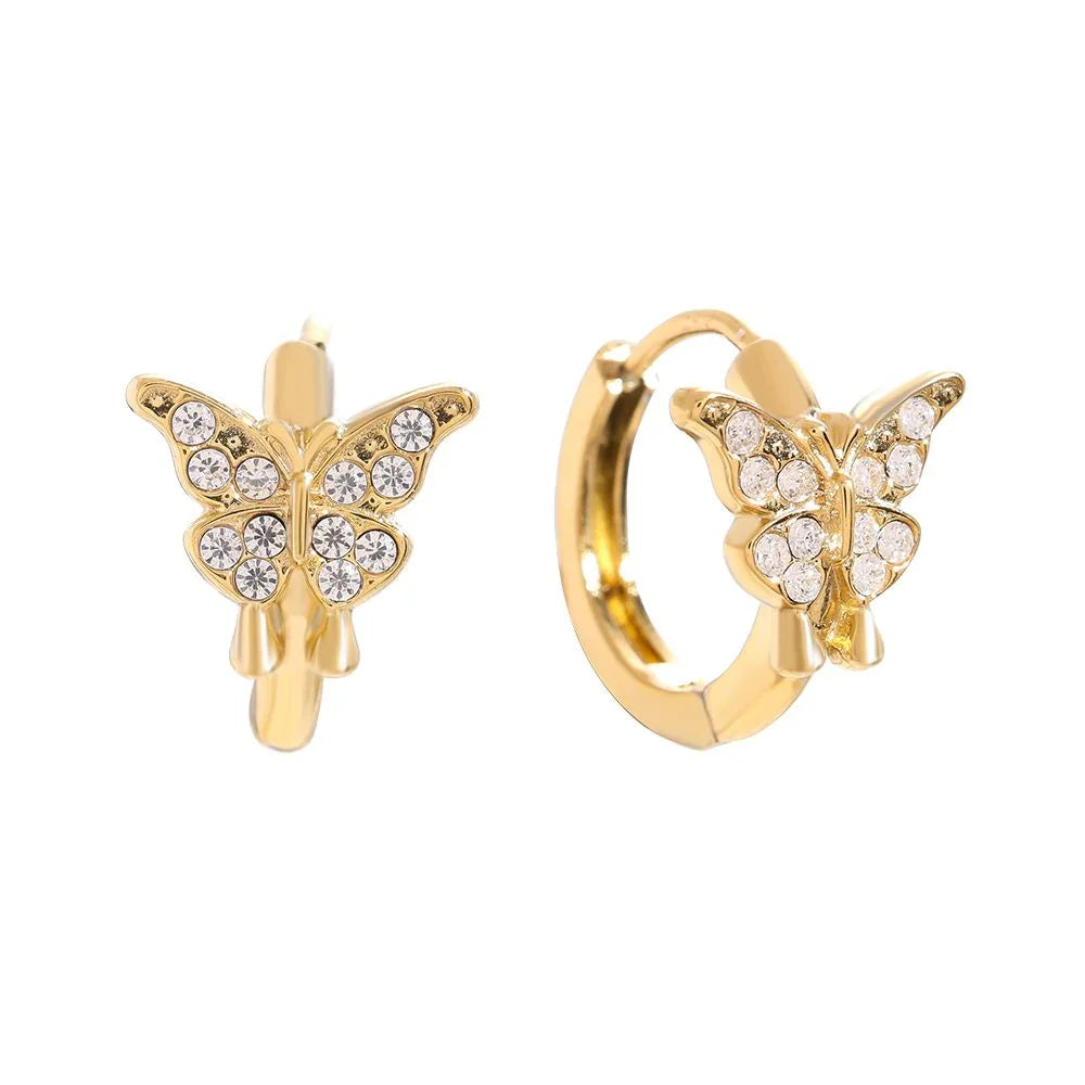 Goldfarbene Creolen-Ohrringe mit Schmetterlingsdesign und funkelnden Kristallsteinen