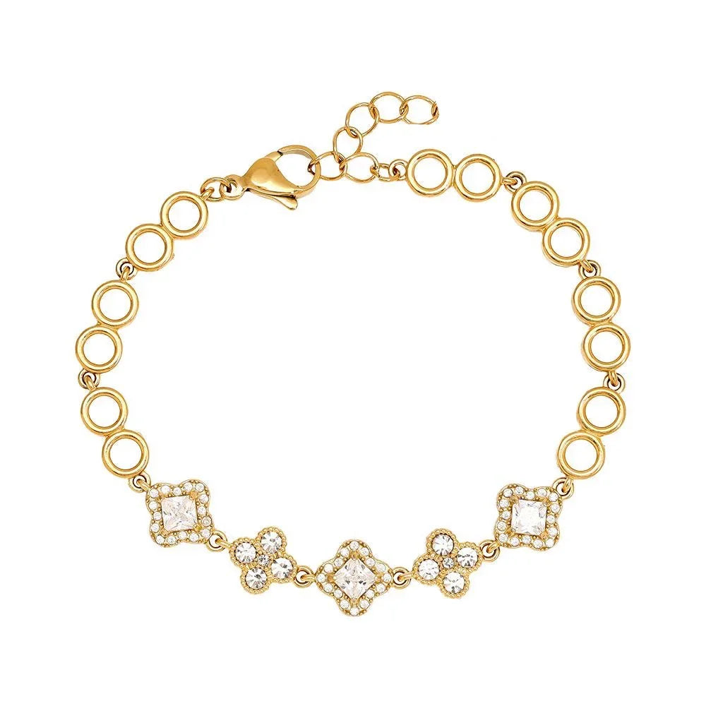 Goldfarbenes Armband mit runden Gliedern und funkelnden Kristall-Details auf weißem Hintergrund