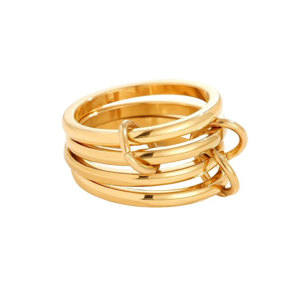 Mehrreihiger goldener Ring mit glatten, glänzenden Oberflächen und dekorativen Schlaufen
