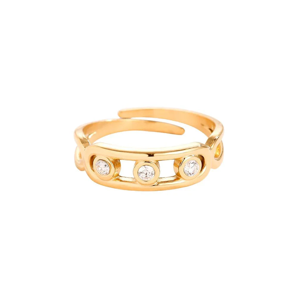 Goldener offener Ring mit drei klaren Kristallen, minimalistisches Design