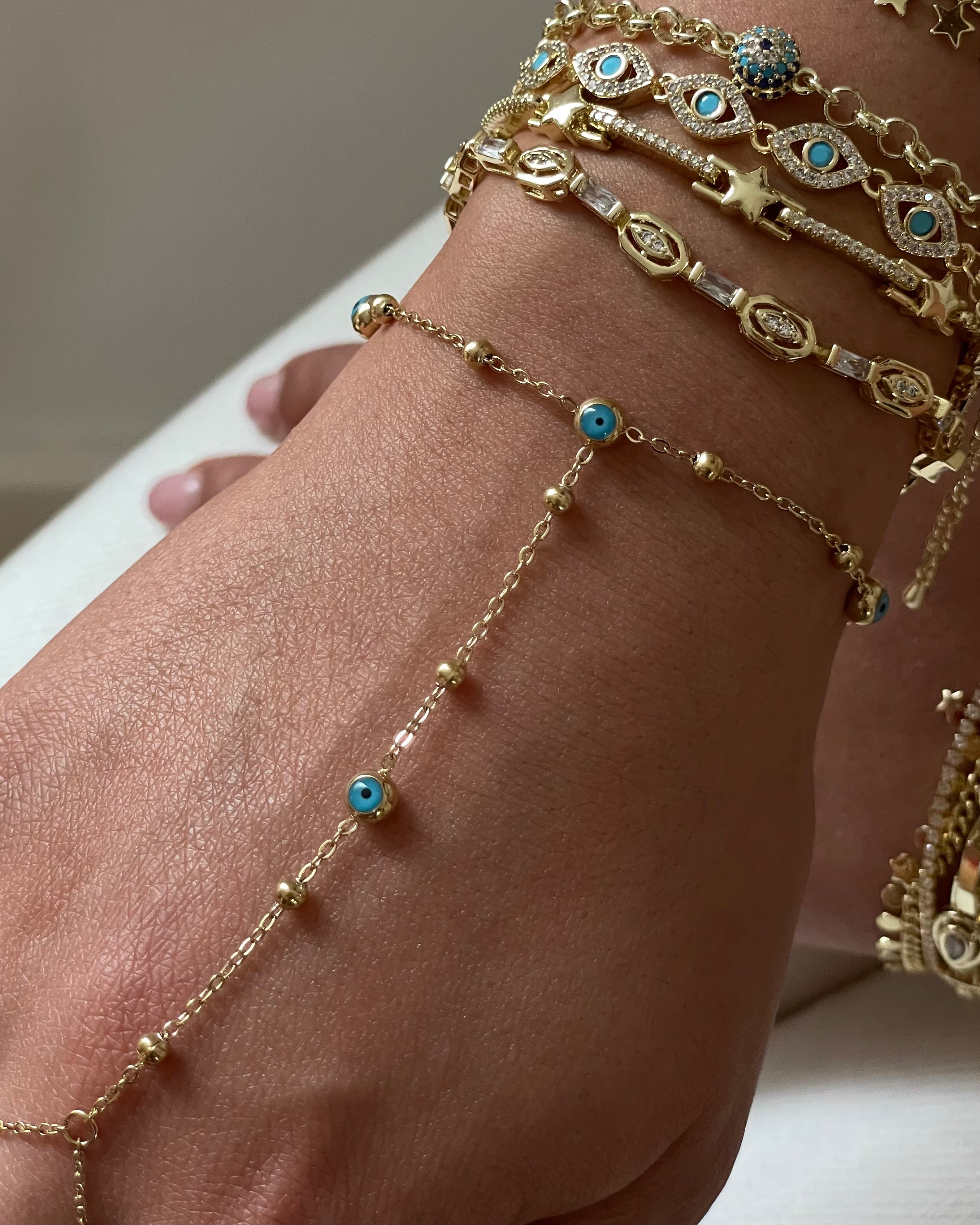 Hand Chain Nazar -18K vergoldet